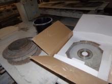 Approx. 13,  Assorted Sizes, Diamond Cutting Blades, On Saw, In Middle Of T