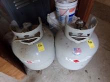 (2) 20lb Grill Tanks (Some Gas) (2 X Bid) (Back Garage)