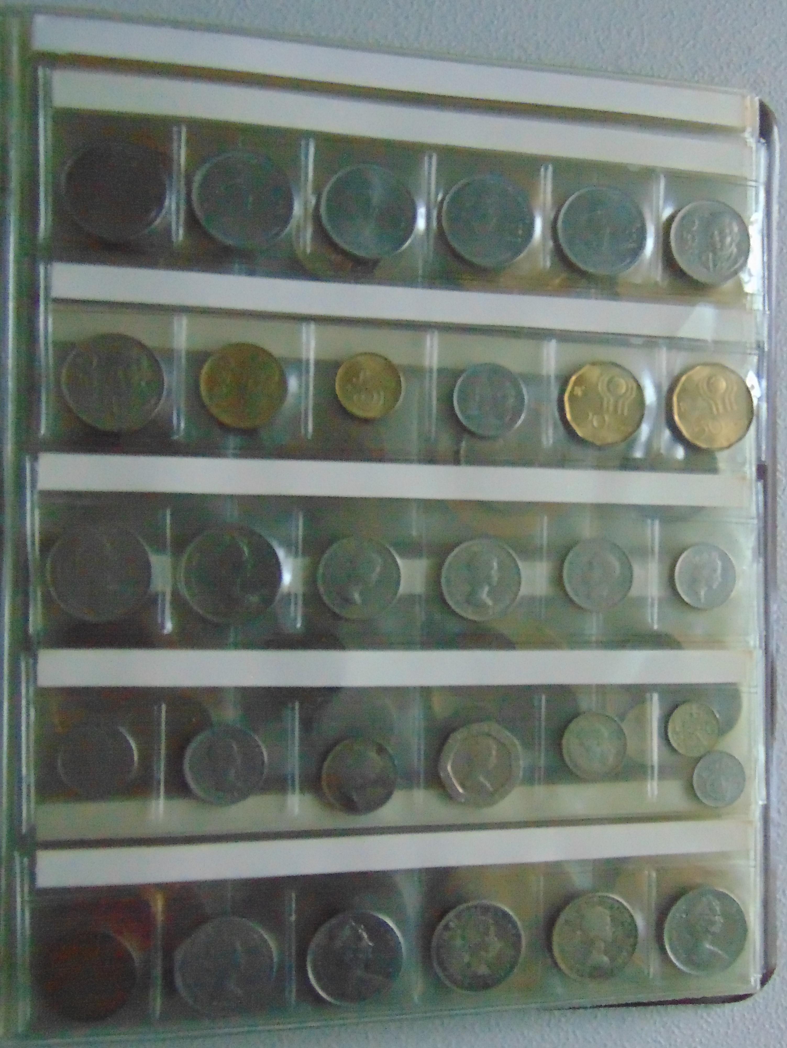 Variety: 74 World Coins (some Silver). 30 Tokens &