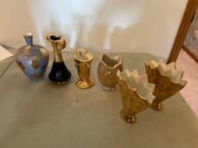 Gold trimmed vases.