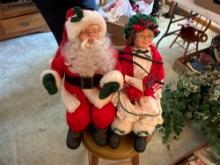 Mini Mr. and Mrs. Santa Claus, wooden chair and rocker, ornate wall shelf.