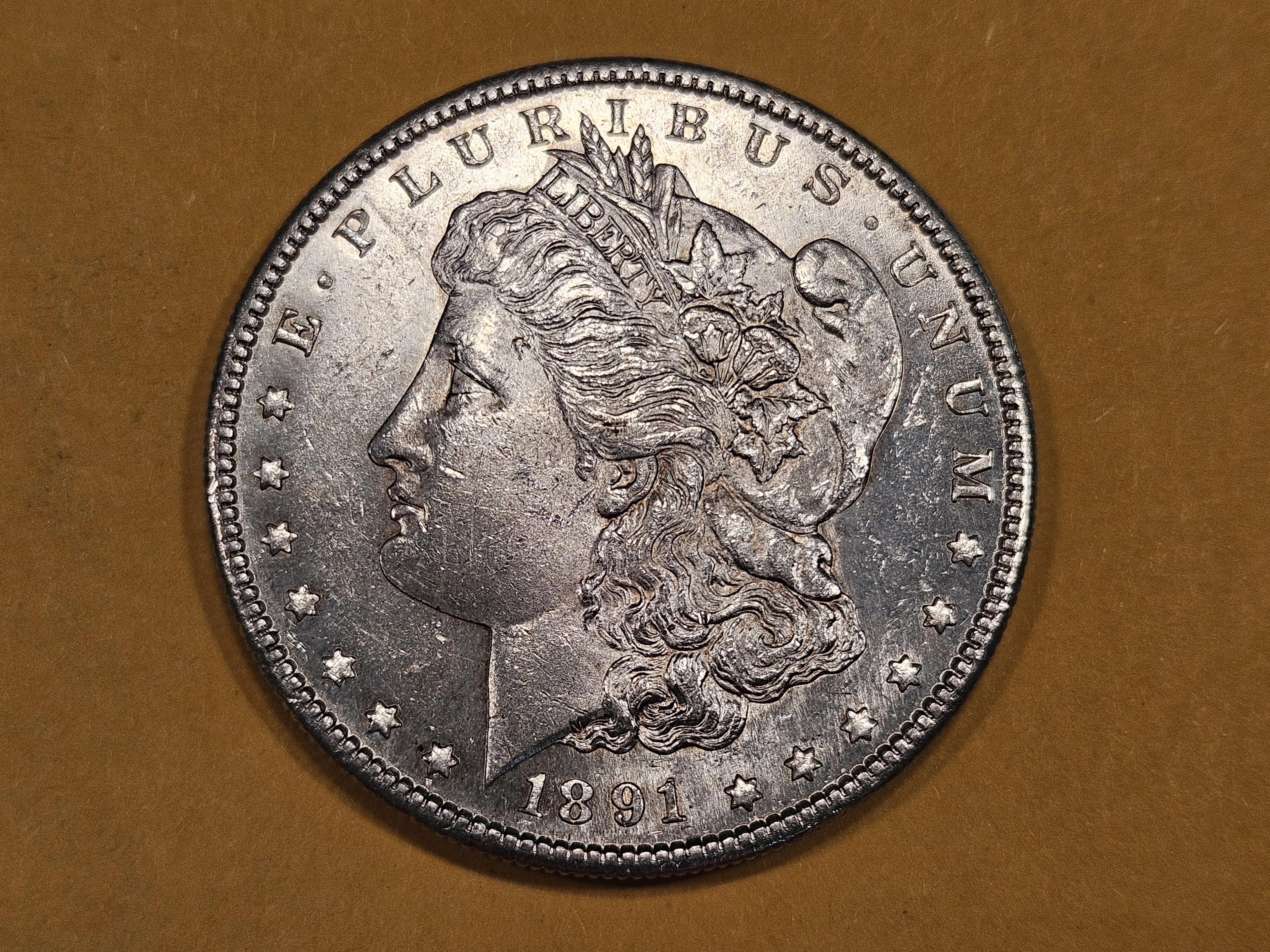 Better date and grade 1891-S Morgan Dollar in Choice Brilliant Uncirculated