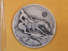 Two ounce high-relief .999 fine Silver Art Round