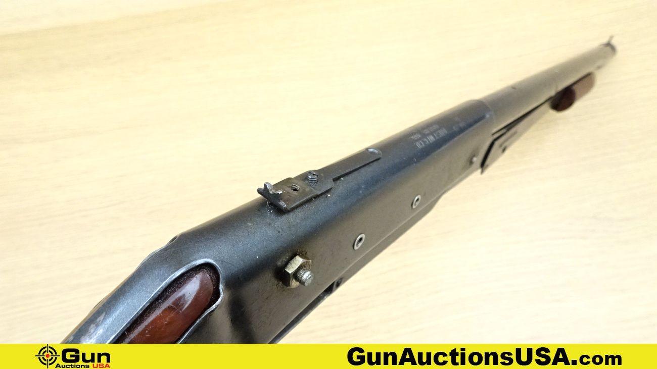 Daisy 25 .177 BB RIFLE. Needs Repair. Pump Action Features a Front Blade Sight, Notch Rear Sight, wi