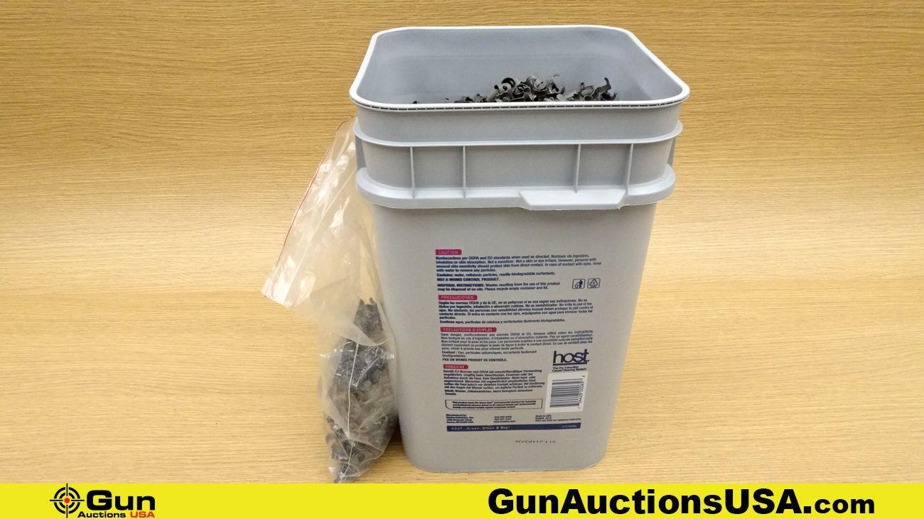 .30 Caliber Links. Approx 2300, 30 caliber Links in a Plastic Bucket. . (70701)