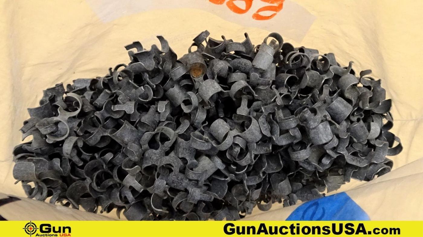 5.6x45, .50 caliber Links. Approx. 290- 5.6x45 Links, and Approx. 322 -.50 caliber links. . (70464)