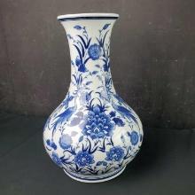 Vintage porcelain blue/white vase with swans/floral design