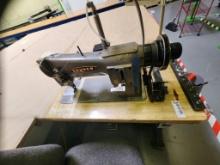 Large table with Consew Industrial sewing machine