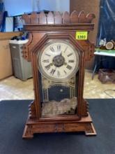 Vintage The Ansonia Clock Co. Carved Wood Mantle Piece Clock with Key and Pendulum