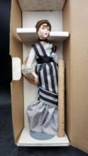 Doll In Striped Dress