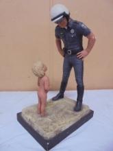 Policeman w/ Naked Boy Statue
