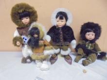 Group of 4 Porcelain Eskimo Dolls