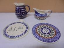 2 Boleslawiec Polish Pottery Pitchers & 2 Trivets