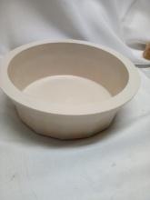 Cream colored dog bowl