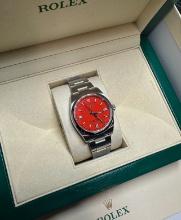 Brand New Discontinued Rolex 36mm Coral Red Dial Comes with Box & Papers