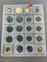 Asst. Commemorative coins/ tokens/ mini Coin sets, these are stapled to the piece of paper shown