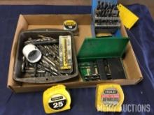 Tape measures and drill bits