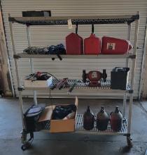 Rack W/ Gas Cans, Rope, 3 Glass Jugs, Bench Grinder, Bolt Cutter, & Misc