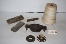 Spool of tobacco string, whetstone, misc tools