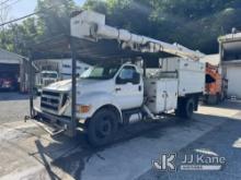 Altec LR760-E70, Over-Center Elevator Bucket Truck mounted behind cab on 2012 Ford F750 Chipper Dump