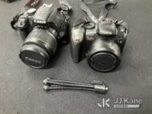Two Canon Cameras (Used) NOTE: This unit is being sold AS IS/WHERE IS via Timed Auction and is locat