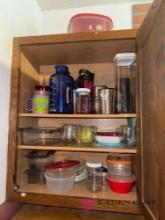 contents of kitchen cabinet cups and storage containers