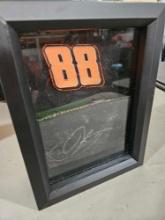 Earnhardt collectible Tire piece with autograph.