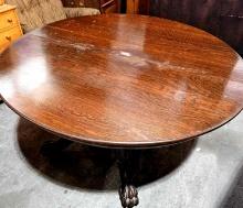 Vintage round clawfoot table.