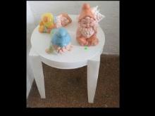 Plastic end tables with 5  ceramic gnomes
