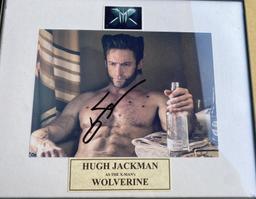 "Wolverine signed and framed action photos
