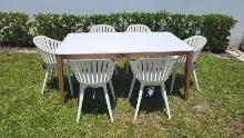 BRAND NEW 67â€� x 40â€� Hard Wood Dining Table with Polypropylene All weather Top and (6) Recycled R