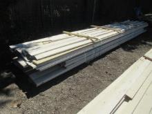 APPROX (60) BOARDS OF ASSORTED COATED LUMBER (UP TO 20' LONG)