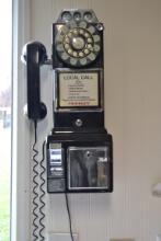 Vintage wall pay phone