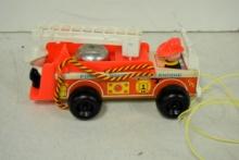 Fisher Price plastic firetruck pull toy