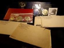 1976 Silver Bicentennial Uncirculated Three-piece Set; 1973 S Silver Uncirculated Eisenhower Dollar;