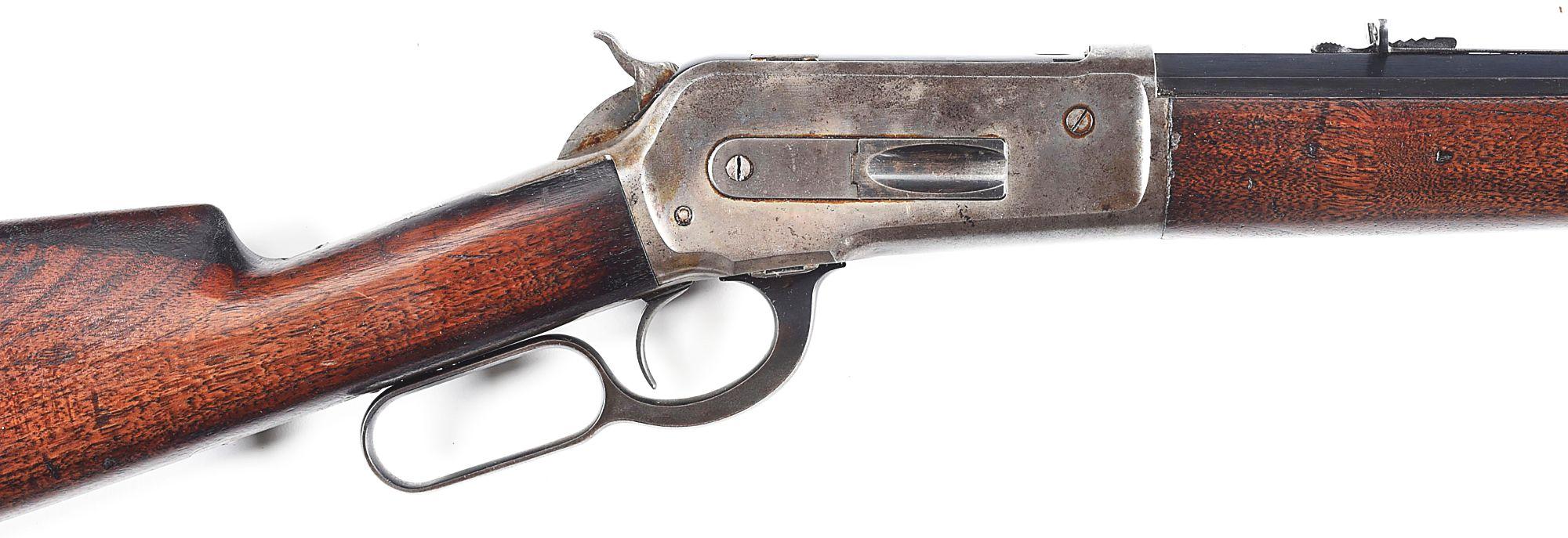 (A) WINCHESTER MODEL 1886 LEVER ACTION RIFLE IN .45-90.