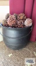 Wooden bucket of cones with metal handle