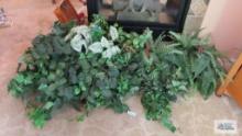 Large variety of green fern and Ivy and other artificial plants