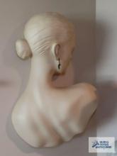 Dimensional plaque of woman with earring