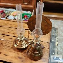 Two different brass oil lamps