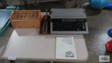 Panasonic electric typewriter, stapler and stationary organizer