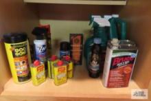 lot of assorted cleaners and floor wax