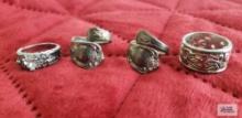 Silver colored clear gemstone ring....Two spoon rings, marked Wm. A. Rogers Oneida. other cutout rin