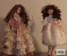 Anastasia porcelain doll with stand and other porcelain doll with stand