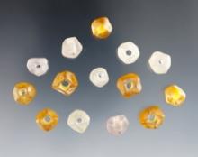Nice set of 14 Faceted Wire Wound Amber and Clear Beads, largest is 1/2". Recovered at the Townley R