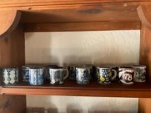 Vintage Royal Copenhagen annual collectable small mugs. 1967-1971 1973-1979.12 mugs total