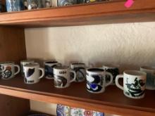 Vintage Royal Copenhagen annual collectable small mugs.1980- 1989 . 10 mugs total