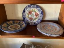 11" pottery plates. 5 pieces