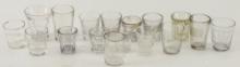 Collection of 17 vintage Shot Glasses, some embossed, some etched with advertising such as: The Hayn