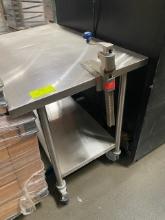 20-27-02-FL 4 foot Stainless Steal Table with Can Open (On wheels)